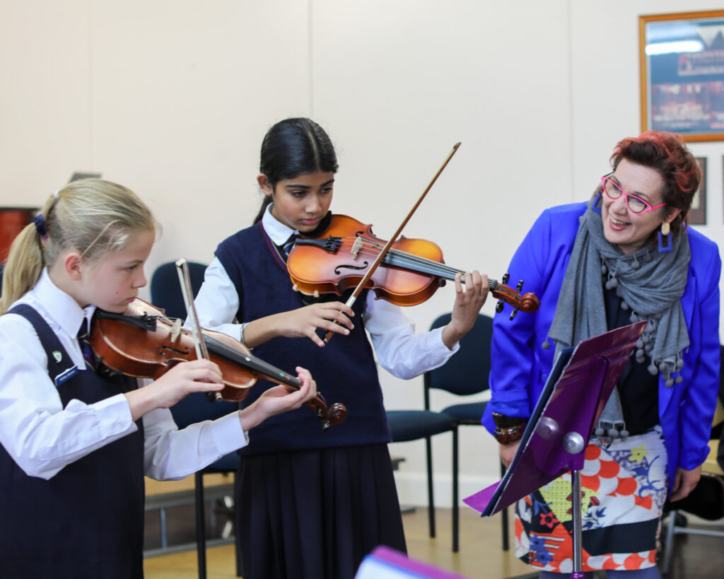 Strings workshop with guest conductor, Louise King